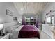 Large main bedroom with a king-size bed and private balcony at 5316 Pebble Beach Dr # E, Orlando, FL 32811