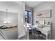 Home office space with built-in desk and plenty of natural light at 5316 Pebble Beach Dr # E, Orlando, FL 32811