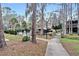 Community walkway leading to pool and clubhouse at 5316 Pebble Beach Dr # E, Orlando, FL 32811