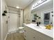 Modern bathroom with subway tile shower, updated vanity, and stylish fixtures at 1048 Wakefield Cir, Deltona, FL 32725