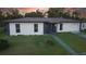 Lovely single-Gathering home with stucco siding, stone accents, and a neatly manicured lawn at 1048 Wakefield Cir, Deltona, FL 32725