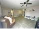 Open floor plan showcases tile flooring, comfortable seating, and a bright, airy atmosphere at 1048 Wakefield Cir, Deltona, FL 32725
