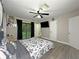 Bright main bedroom with sliding glass door to the backyard at 1048 Wakefield Cir, Deltona, FL 32725