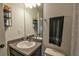 Simple bathroom with single vanity, toilet and shower at 4815 Rigging St, Haines City, FL 33844