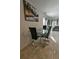 Modern glass dining table with four black chairs at 4815 Rigging St, Haines City, FL 33844