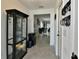 Bright and spacious entryway with tiled floors and glass-front cabinet at 4815 Rigging St, Haines City, FL 33844