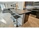 Modern kitchen island with seating for three at 4815 Rigging St, Haines City, FL 33844