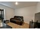Media room featuring a large TV and reclining sofa at 4815 Rigging St, Haines City, FL 33844
