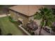 View of the side of the townhome and the garage at 8979 Azalea Sands Ln, Davenport, FL 33896