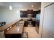 The kitchen boasts granite counters, stainless appliances, and ample cabinet space at 8979 Azalea Sands Ln, Davenport, FL 33896