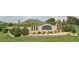 Attractive community entrance with landscaping and signage at 9875 Sw 55Th Ct, Ocala, FL 34476