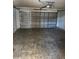 Attached garage with ample space for parking and storage at 9875 Sw 55Th Ct, Ocala, FL 34476