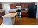 Modern kitchen with stainless steel appliances and ample counter space at 9875 Sw 55Th Ct, Ocala, FL 34476