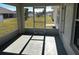 Screened porch overlooking backyard at 9875 Sw 55Th Ct, Ocala, FL 34476