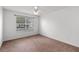 Bedroom with neutral walls and carpet with an abundance of light from the window at 3623 Worth Cir, The Villages, FL 32162