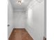Spacious walk-in closet features sturdy wire shelving and neutral carpeting at 3623 Worth Cir, The Villages, FL 32162