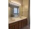 Bathroom features double sink vanity and separate tub at 10198 Oak Crest Rd, Orlando, FL 32829