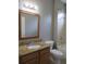 This bathroom features a granite vanity and shower/tub combo at 10198 Oak Crest Rd, Orlando, FL 32829