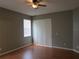 Spacious bedroom is bright with natural light and sliding glass doors at 10198 Oak Crest Rd, Orlando, FL 32829