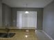 The dining area features a granite countertop breakfast bar at 10198 Oak Crest Rd, Orlando, FL 32829