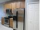 Well-equipped kitchen features stainless steel appliances and ample cabinet space at 10198 Oak Crest Rd, Orlando, FL 32829