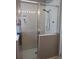 The primary bathroom includes a glass door shower with a rainfall showerhead at 10198 Oak Crest Rd, Orlando, FL 32829