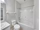 Bathroom with bathtub, shower, and single vanity with white countertop at 1106 Presidential Ln, Apopka, FL 32703