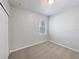 Bedroom with carpet floors, a window, and a closet at 1106 Presidential Ln, Apopka, FL 32703