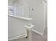 Hallway featuring white railings and neutral-colored walls at 1106 Presidential Ln, Apopka, FL 32703