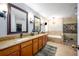 Spa-like bathroom with soaking tub and walk-in shower at 2399 Parkside Glen Dr, Apopka, FL 32712