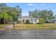 Two-story house with a well-maintained lawn at 2399 Parkside Glen Dr, Apopka, FL 32712