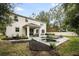 Two-story house with pool and landscaped yard at 2399 Parkside Glen Dr, Apopka, FL 32712