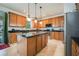 Modern kitchen featuring granite countertops and stainless steel appliances at 2399 Parkside Glen Dr, Apopka, FL 32712