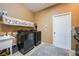 Laundry room with washer, dryer, and utility sink at 2399 Parkside Glen Dr, Apopka, FL 32712