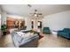 Open concept living room, seamlessly connected to the kitchen and dining areas at 2399 Parkside Glen Dr, Apopka, FL 32712