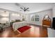 Spacious main bedroom with wood floors and en-suite bathroom at 2399 Parkside Glen Dr, Apopka, FL 32712