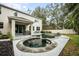 Large pool and spa surrounded by a patio at 2399 Parkside Glen Dr, Apopka, FL 32712