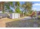 White shed in backyard, providing extra storage space at 4535 Arch St, Orlando, FL 32808