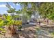 Spacious backyard with patio, shed, and lush landscaping at 4535 Arch St, Orlando, FL 32808