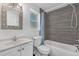 Bathroom with tub, toilet, and vanity at 4535 Arch St, Orlando, FL 32808