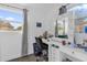 Bedroom area with a vanity, a desk, and natural light at 4535 Arch St, Orlando, FL 32808