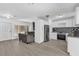 Modern kitchen with white cabinets and granite countertops at 4535 Arch St, Orlando, FL 32808