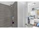 Modern shower with gray tile walls at 4535 Arch St, Orlando, FL 32808