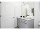 Well-lit bathroom showcasing vanity with granite countertop and modern fixtures at 6240 Sand Skipper Rd, Orlando, FL 32821