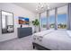 This bedroom offers natural light, a modern color scheme, and comfortable furnishings at 6240 Sand Skipper Rd, Orlando, FL 32821
