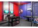 Game room with foosball table, gaming consoles, and Captain America shield decoration for endless entertainment at 6240 Sand Skipper Rd, Orlando, FL 32821
