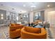 Open-concept living room with modern furnishings and ample seating perfect for entertaining and relaxation at 6240 Sand Skipper Rd, Orlando, FL 32821
