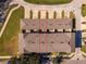 Unique roof-level view of a townhome highlighting the backyard patio and private parking at 13228 Daniels Landing Cir, Winter Garden, FL 34787