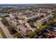 Bird's-eye view showcasing the well-planned layout of the residential townhome community and surrounding greenery at 13228 Daniels Landing Cir, Winter Garden, FL 34787
