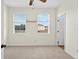 Bedroom with two windows and carpet flooring at 13228 Daniels Landing Cir, Winter Garden, FL 34787